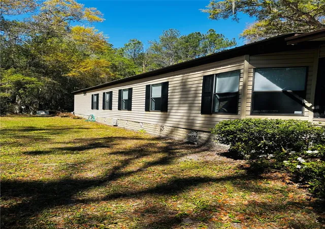 Homes for sale in Brooksville, FL | 7053 Spanish Moss Ln, Brooksville, FL 34601 | MLS# TB8445649