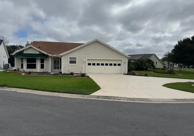 1st image of 903 Ramos Dr, Lady Lake, FL 32159 | MLS# O6358859