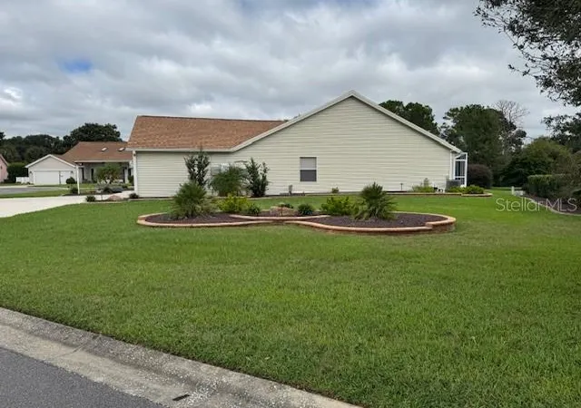4th image of 903 Ramos Dr, Lady Lake, FL 32159 | MLS# O6358859