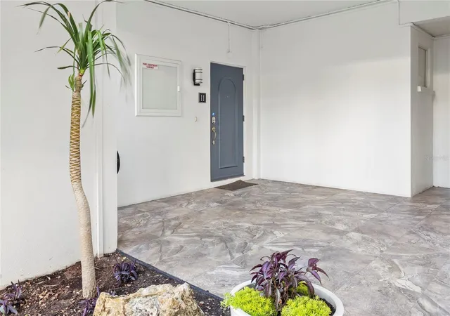 Listing Photo 2 - Condo for sale in building located at 400 Golden Gate Pt, Sarasota, FL 34236 - Unit #11