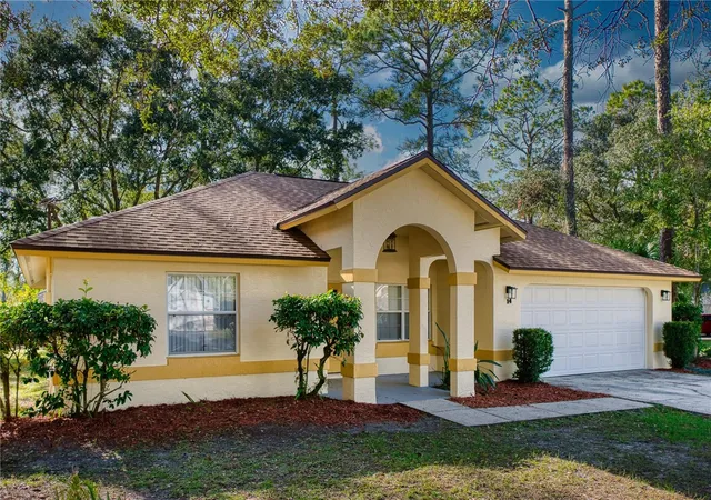 Photo 1 of Single family home for sale at 14 Wellshire Ln, Palm Coast, FL 32164 | MLS# FC313986 | Listing updated on 2026-09-26