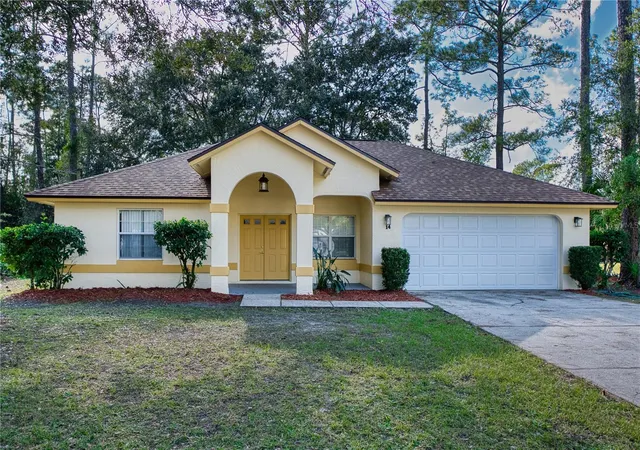 Photo 2 of Single family home for sale at 14 Wellshire Ln, Palm Coast, FL 32164 | MLS# FC313986 | Listing updated on 2026-09-26