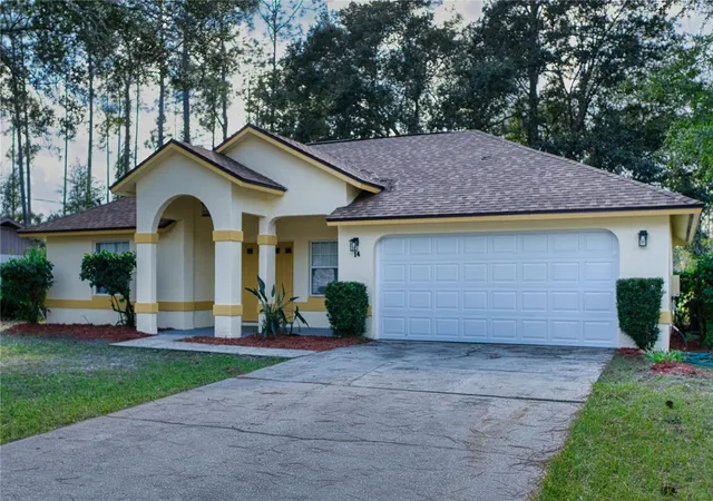 Photo 3 of Single family home for sale at 14 Wellshire Ln, Palm Coast, FL 32164 | MLS# FC313986 | Listing updated on 2026-09-26
