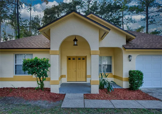 Photo 4 of Single family home for sale at 14 Wellshire Ln, Palm Coast, FL 32164 | MLS# FC313986 | Listing updated on 2026-09-26