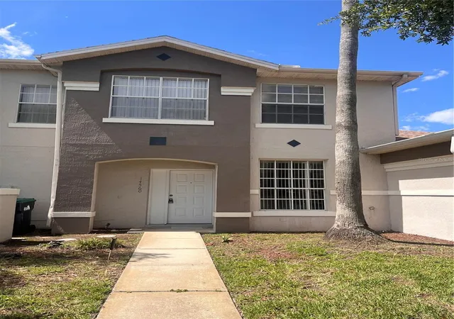 Photo 2 of Townhouse for sale at 14560 Laguna Beach Cir, Orlando, FL 32824 | MLS# O6359278 | Listing updated on 2026-07-25