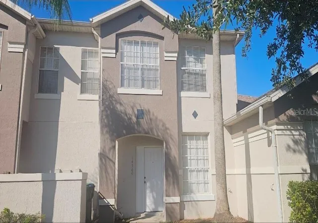 Photo 1 of Townhouse for sale at 14560 Laguna Beach Cir, Orlando, FL 32824 | MLS# O6359278 | Listing updated on 2026-07-25