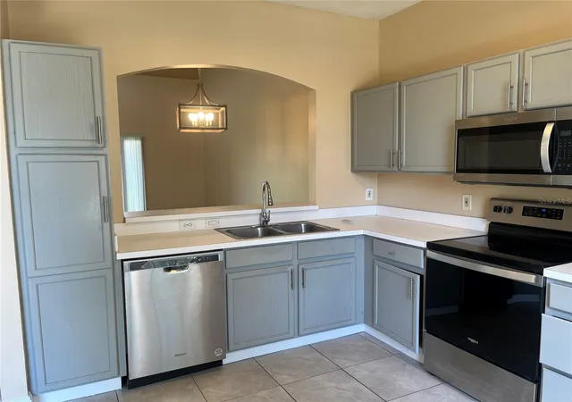 Photo 4 of Townhouse for sale at 14560 Laguna Beach Cir, Orlando, FL 32824 | MLS# O6359278 | Listing updated on 2026-07-25