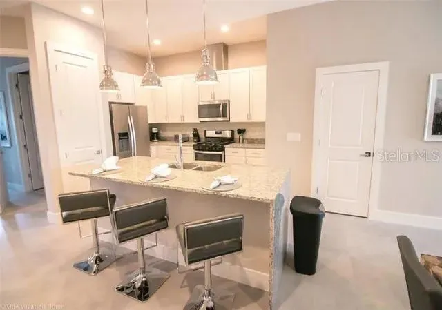 Photo 2 of Townhouse for sale at 7520 Sunville Ave, Kissimmee, FL 34747 | MLS# O6359702 | Listing updated on 2026-09-19
