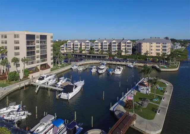 Listing Photo 2 - Condo for sale in building located at 5855 Midnight Pass Rd, Sarasota, FL 34242 - Unit #420