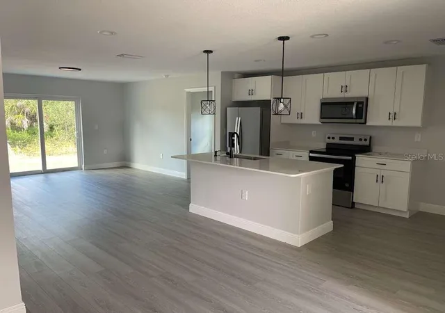 Photo 3 of Single family home for sale at 17512 Poston Ave, Port Charlotte, FL 33948 | MLS# O6360337 | Listing updated on 2026-09-01