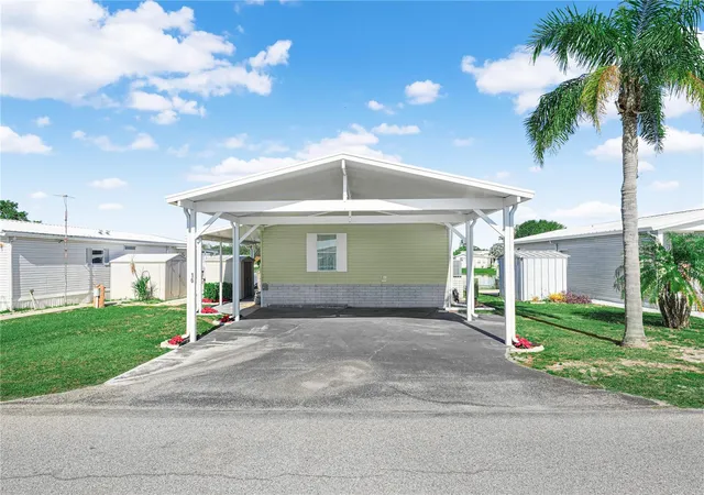 Photo 2 of Manufactured home for sale at 16 Queen Of Waters St, Lake Wales, FL 33898 | MLS# K4903141 | Listing updated on 2026-05-19