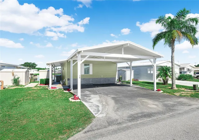 Photo 3 of Manufactured home for sale at 16 Queen Of Waters St, Lake Wales, FL 33898 | MLS# K4903141 | Listing updated on 2026-05-19