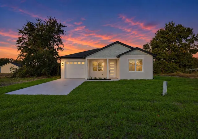 Photo 1 of Single family home for sale at 12414 Se 106th Court, Belleview, FL 34420 | MLS# OM713561 | Listing updated on 2026-09-13