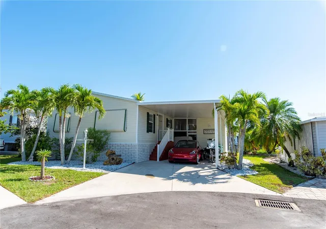 Photo 1 of Manufactured home for sale at 15 Rotterdam Dr, Punta Gorda, FL 33950 | MLS# C7517793 | Listing updated on 2026-10-03