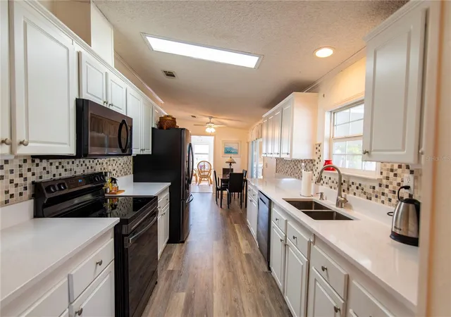 Photo 3 of Manufactured home for sale at 15 Rotterdam Dr, Punta Gorda, FL 33950 | MLS# C7517793 | Listing updated on 2026-08-15
