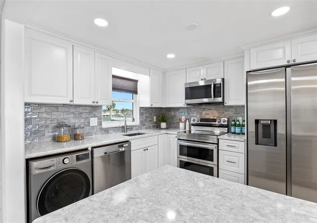 Listing Photo 4 - Condo for sale in building located at 4775 Cvs Cir, Madeira Beach, FL 33708 - Unit #203