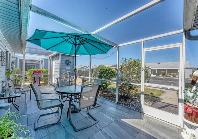 Listing Photo 1 - Condo for sale in building located at 3300 Loveland Blvd, PORT CHARLOTTE, FL 33980 - Unit #1201