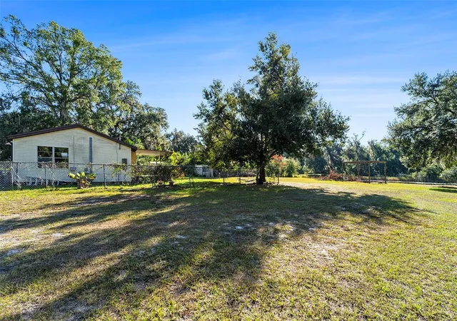 4th image of 2215 Wallace Rd, Lutz, FL 33549 | MLS# TB8450439