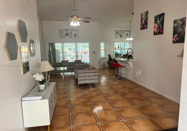 5th image of 713 5Th Ave, Lehigh Acres, FL 33972 | MLS# TB8450590