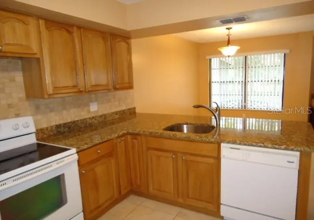 Photo 3 of Townhouse for sale at 4012 Circlewood Ct, Tampa, FL 33614 | MLS# TB8451775 | Listing updated on 2026-09-13