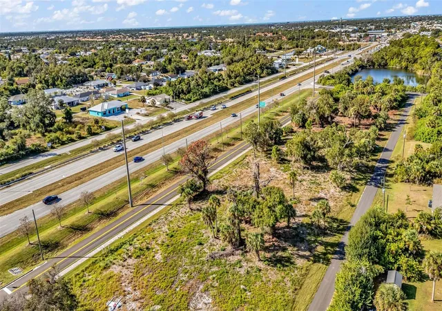 Photo 1 of Land for sale at 3278 3294 N Access Rd, Englewood, FL 34224 | MLS# C7518370 | Listing updated on 2026-07-13