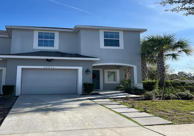 Photo 1 of Townhouse for sale at 10731 Silk Tree Ct, Orlando, FL 32824 | MLS# O6364402 | Listing updated on 2026-02-08