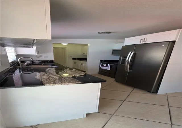 Photo 3 of Sale Pending at 6813 Tuttle St, Tampa, FL 33634 | MLS# TB8452868 | Listing updated on 2026-10-02