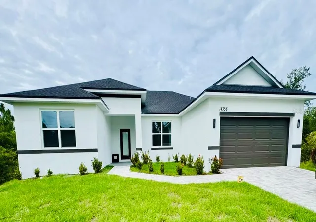 1st image of 14358 Mcfarland Ave, Port Charlotte, FL 33981 | MLS# O6364605