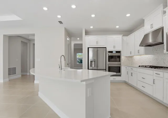 Photo 4 of Single family home for sale at 664 Junonia Blvd, New Smyrna Beach, FL 32168 | MLS# O6365891 | Listing updated on 2026-10-04