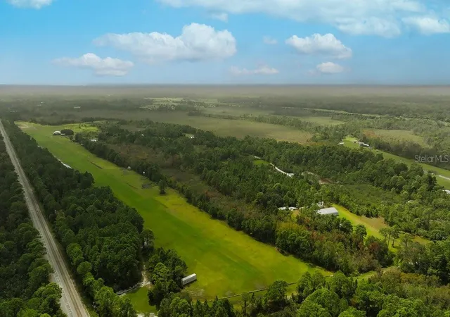 Photo 3 of Land for sale at 520 Highlander Dr #Lot 5, Oak Hill, FL 32759 | MLS# V4946230 | Listing updated on 2026-01-13