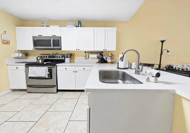 Photo 2 of Townhouse for sale at 12718 Wood Trl Blvd, Tampa, FL 33625 | MLS# TB8455343 | Listing updated on 2026-08-29