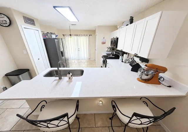 Photo 3 of Townhouse for sale at 12718 Wood Trl Blvd, Tampa, FL 33625 | MLS# TB8455343 | Listing updated on 2026-08-29