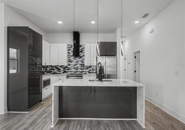 4th image of 2305 W Kentucky Ave, Tampa, FL 33607 | MLS# TB8455408