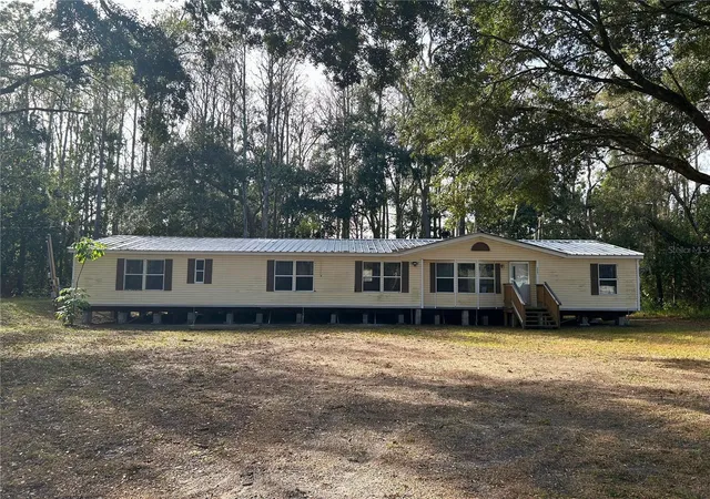 Photo 1 of Manufactured home for sale at 9867 Jerome Dr, New Port Richey, FL 34654 | MLS# W7881360 | Listing updated on 2026-06-14