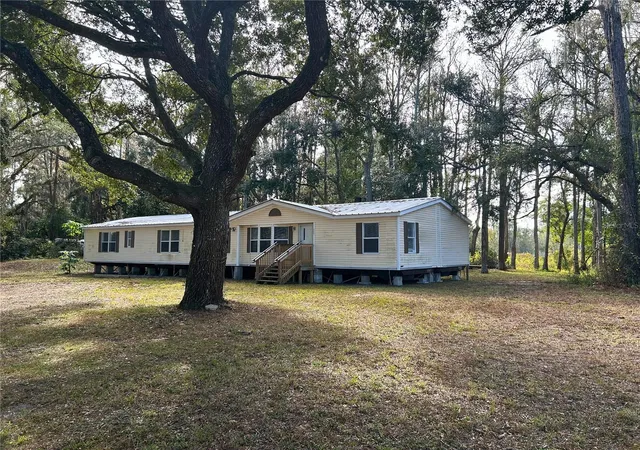 Photo 3 of Manufactured home for sale at 9867 Jerome Dr, New Port Richey, FL 34654 | MLS# W7881360 | Listing updated on 2026-06-14