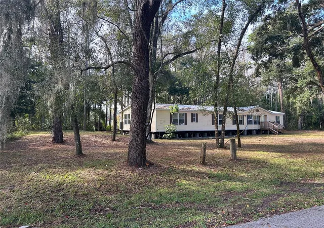 Photo 4 of Manufactured home for sale at 9867 Jerome Dr, New Port Richey, FL 34654 | MLS# W7881360 | Listing updated on 2026-06-14