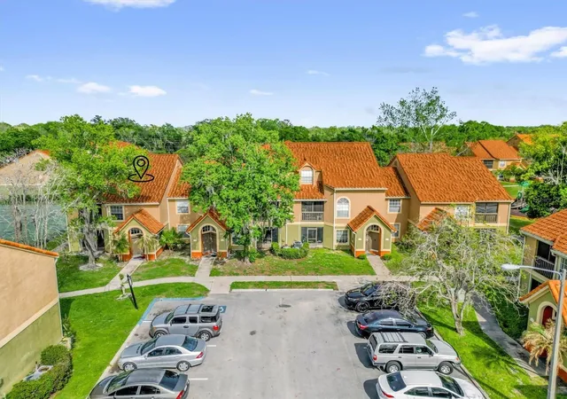 Listing Photo 1 - Condo for sale in building located at 409 Fountainhead Cir, Kissimmee, FL 34741 - Unit #236