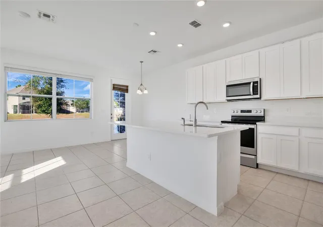 Photo 4 of Townhouse for sale at 1484 Discovery St, Davenport, FL 33896 | MLS# O6367290 | Listing updated on 2026-08-13