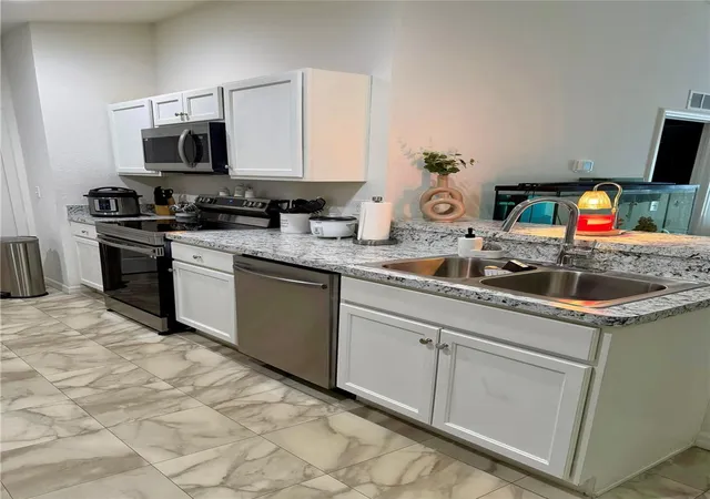 Photo 2 of Single family home for sale at 2713 Hudson St, Lakeland, FL 33810 | MLS# TB8456624 | Listing updated on 2026-10-22