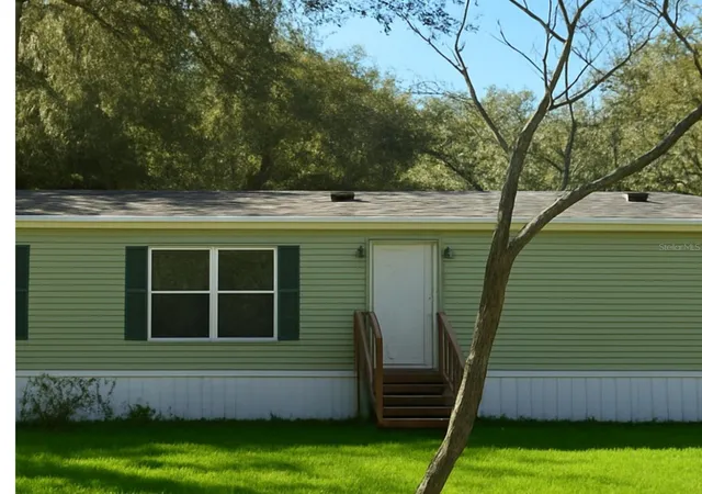 Photo 2 of Manufactured home for sale at 14640 Ne 149th Lane, Fort Mc Coy, FL 32134 | MLS# OM715157 | Listing updated on 2026-07-08