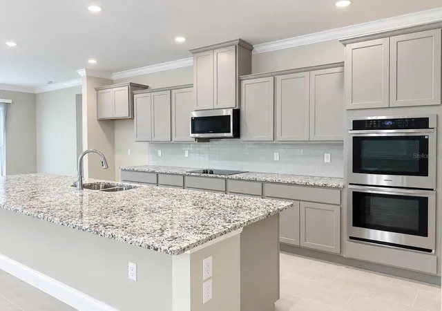 Photo 2 of Single family home for sale at 930 Buckeye Dr, Lady Lake, FL 32159 | MLS# O6367892 | Listing updated on 2026-09-21