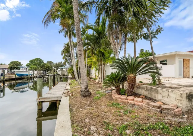 Single family home for sale at 9570 Sun Isle Dr NE, Saint Petersburg, FL 33702 | MLS# TB8457108
