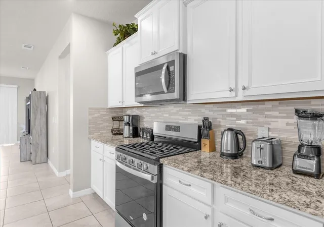 5th image of 7211 Oakmoss Loop, Davenport, FL 33837 | MLS# O6368275