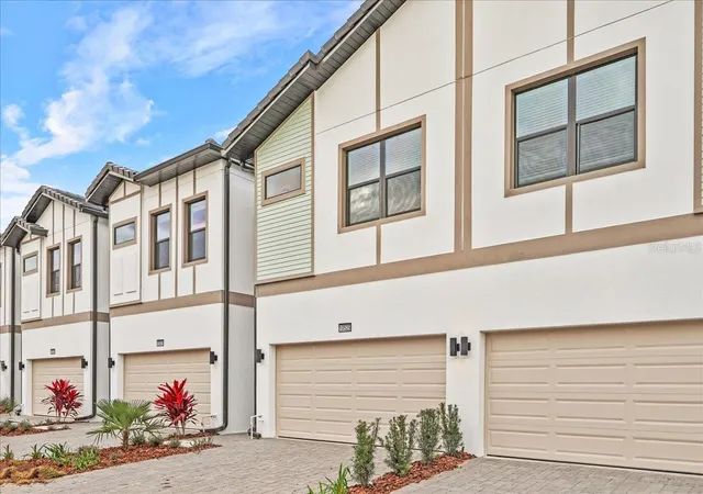 Photo 2 of Townhouse for sale at 10525 Ebb Tide Ln, Orlando, FL 32821 | MLS# O6368792 | Listing updated on 2026-01-15