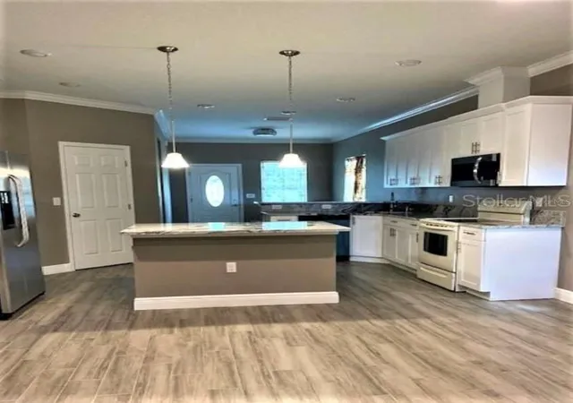 Photo 2 of Sale Pending at 39410 Kennedy Ave, Zephyrhills, FL 33542 | MLS# TB8458383 | Listing updated on 2026-06-29