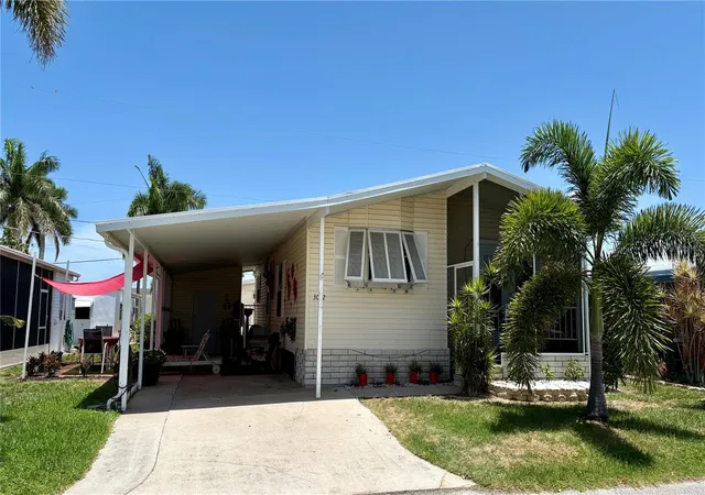 Photo 2 of Manufactured home for sale at 3002 12th Street W, Palmetto, FL 34221 | MLS# A4676062 | Listing updated on 2026-09-05