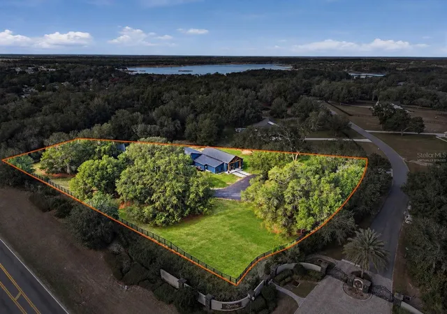 Photo 3 of Single family home for sale at 12052 SE 101st Court Rd, Belleview, FL 34420 | MLS# OM715526 | Listing updated on 2026-10-26