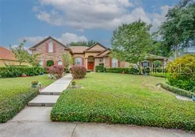 Photo 1 of Single family home for sale at 3907 Winding Lake Cir, Orlando, FL 32835 | MLS# O6369141 | Listing updated on 2026-10-09