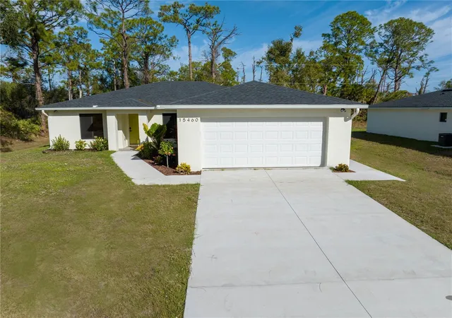 Photo 1 of Single family home for sale at 15460 Chamberlain Blvd, Port Charlotte, FL 33953 | MLS# C7519425 | Listing updated on 2026-07-22