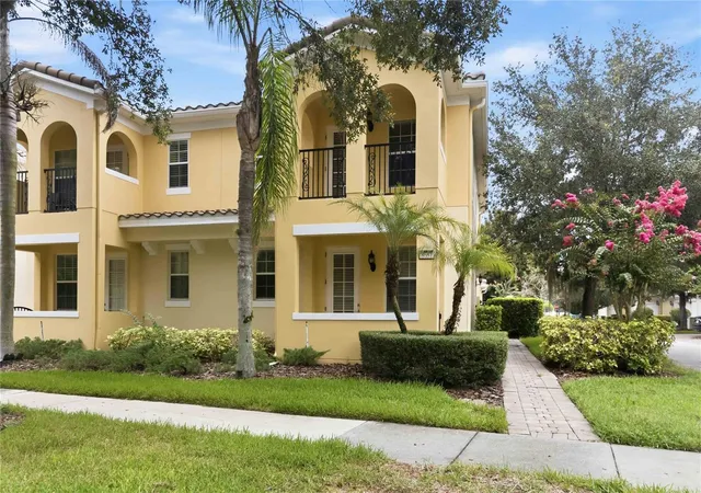 Photo 1 of Townhouse for sale at 8681 Lower Villagewalk Cir, Orlando, FL 32827 | MLS# O6369740 | Listing updated on 2026-08-01